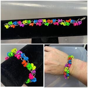 bright neon nut bracelet 7.25” adjustable. dangle. 80’s neon. New